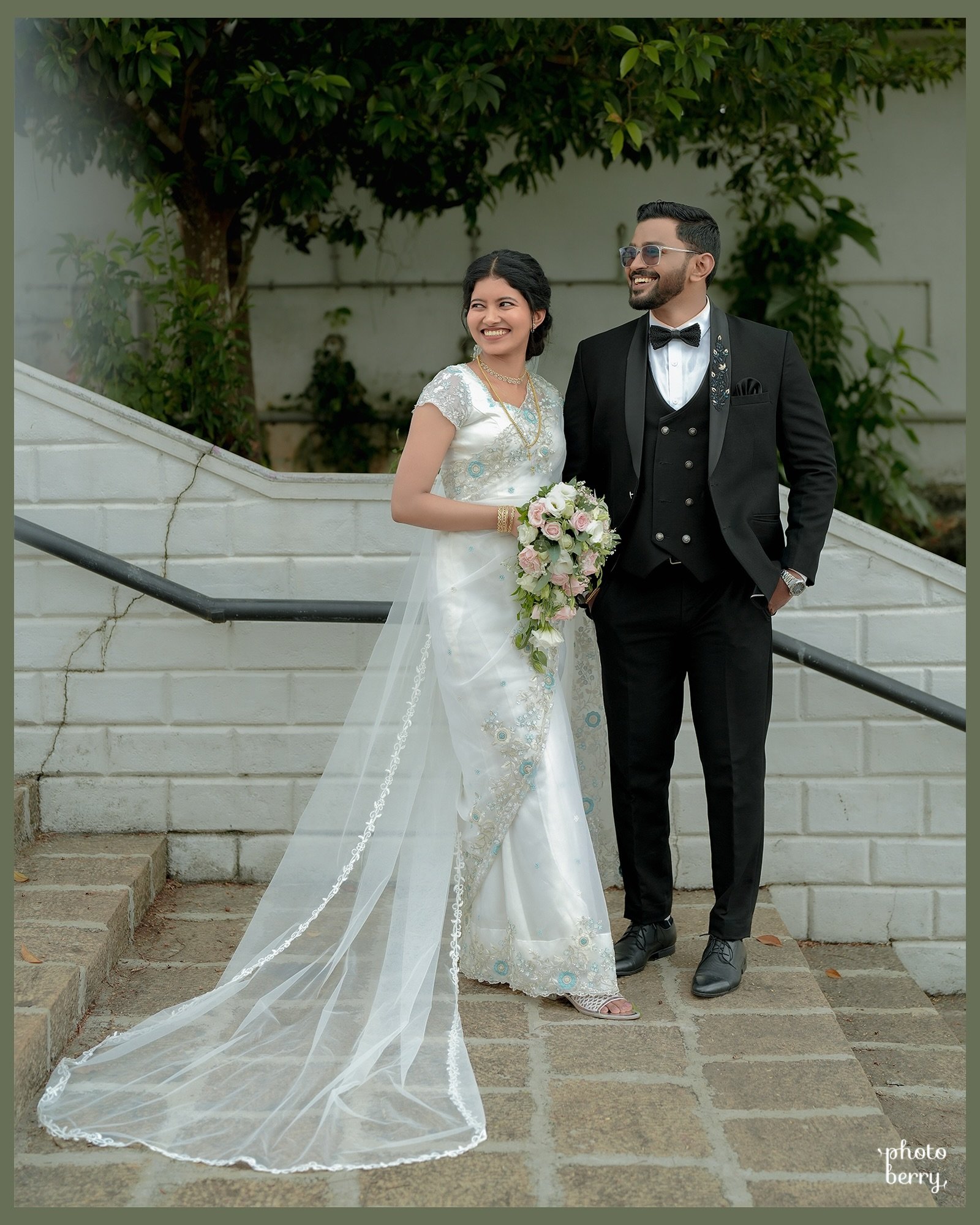 A bride smiling in a natural wedding portrait